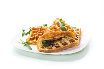 Egg omelette stuffed with onions and herbs, fried in the form of waffles