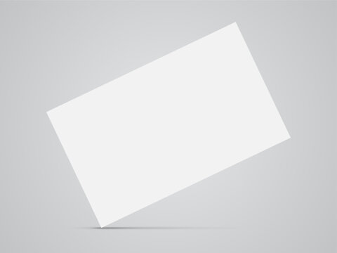 A white business card mock up with a shadow