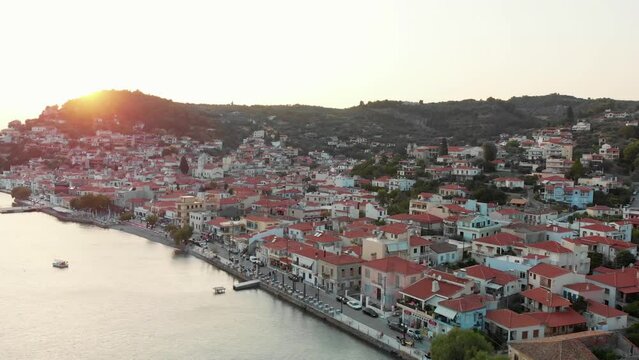 Sunset over coastal villiage in Evia Greece. Aerial drone shot