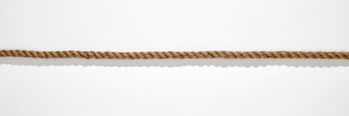 Straight rope with shadow on white background