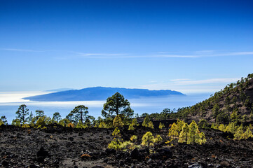 volcanic landscape and an island on the background