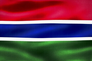 Gambia flag - realistic waving fabric flag. Flag concept background