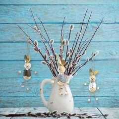 Bouquet of willow branches on a wooden background
