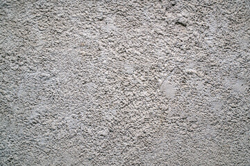 Rough gray cement wall surface for background and design