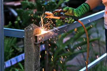 Metal welding. Welding metal structures causes sparks. Safety concept in dangerous workplace