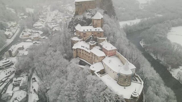 Aerial of the Orava castle in Oravsky Podzamok city, Slovakia on cold snowy weather