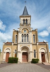 Fototapeta na wymiar Exterior shot of the Catholic Saint Didier church in the French village of Joncy.