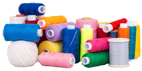Heap of many colorful spools with thread for sewing, supply for sewing with needle, isolated...