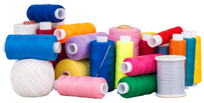 Heap of many colorful spools with thread for sewing, supply for sewing with needle, isolated objects cut out 
