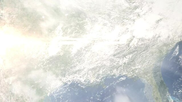 Earth zoom in from outer space to city. Zooming on Greenville, Mississippi, USA. The animation continues by zoom out through clouds and atmosphere into space. Images from NASA