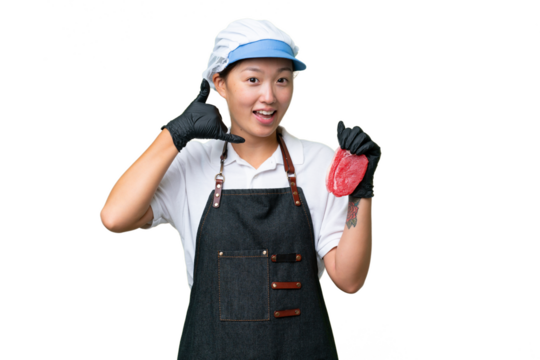 Young caucasian woman wearing an apron and serving fresh cut meat over isolated background making phone gesture. Call me back sign