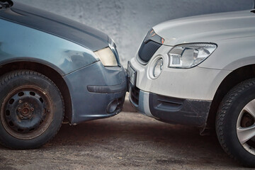 Car parking collision, minor damage. Parking accident between two cars on the street. Road...