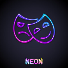 Glowing neon line Comedy and tragedy theatrical masks icon isolated on black background. Vector