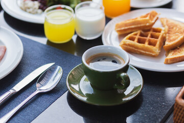 Coffee on the table at breakfast