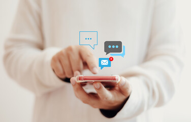 Notification concept, businessman holding smartphone touch white newsletter like e-mail