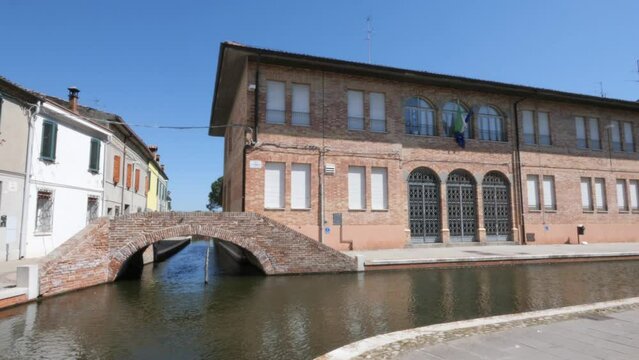 Comacchio, Italy, view of the Theater bridge and the Carducci school