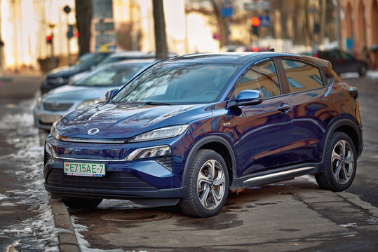 Minsk, Belarus. Mar 2023. Electric car Honda M-NV (Dongfeng) at paking lot. Blue electric SUV parked at city street. Electric vehicle - EV car.