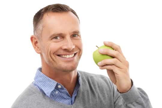 Smile, healthy food or portrait of happy man with an apple isolated on transparent png background. Nutrition vitamins, detox or mature person eating fresh fruit to lose weight, diet or wellness