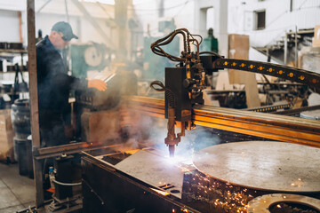 cutting steel machine by oxyflame and plasma in a factory