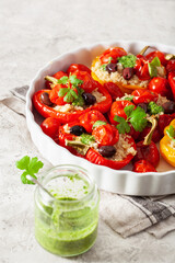 stuffed bell peppers with quinoa tomatoes olives and herb sauce chimichurri