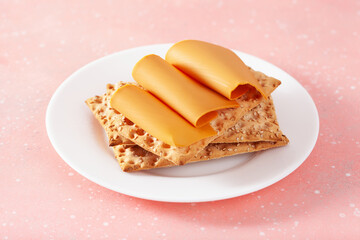 crispbread with Norwegian brunost traditional brown cheese