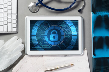 Web security and technology concept with tablet pc on table