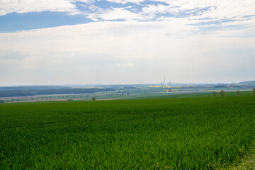 Landscape shot of fields and cloudy sky