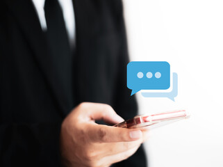 Notification concept, businessman holding smartphone touch white newsletter like e-mail