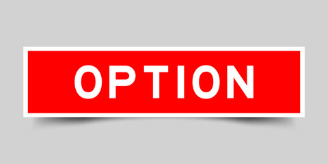 Red color square label sticker with word option on gray background