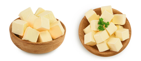 butter cubes in wooden bowl isolated on white background with full depth of field. Top view. Flat lay