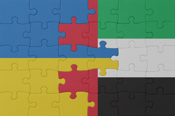 puzzle with the national flag of ukraine and united arab emirates . macro.concept.