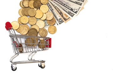 Shopping cart full of coins on white background, shopping concept