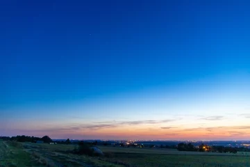 Abwaschbare Fototapete Dunkelblau Panoramic view at the blue hour on a landscape