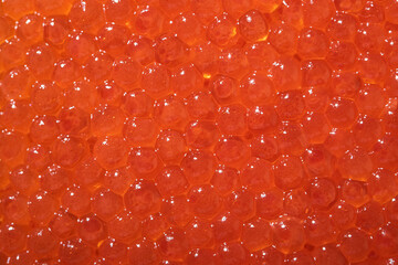 Texture photo of red caviar close up