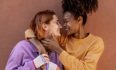 Lesbian couple having tender moments outdoor - Lgbt and love relationship concept