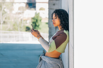 girl on the street with mobile phone