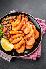 shrimp prawn fresh seafood plater meal food snack on the table copy space food background rustic top view 