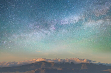 Beautiful night landscape,  mountains and hills in the starry night with milky way galaxy.