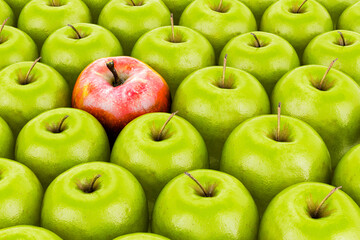 One red apple on a background of green apples. 3D rendering