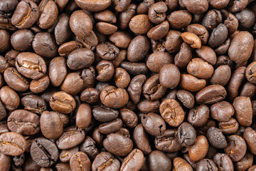 Fresh roasted brown coffee beans background