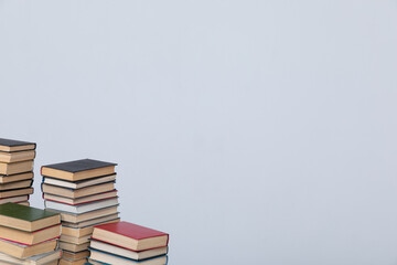 stack of books on a white background in the learning library