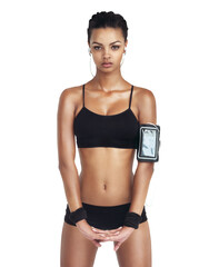 Fototapeta premium Fitness, body and power portrait of woman with phone, earphones and music at gym workout. Health, exercise and sports girl listening to mobile streaming app isolated on transparent png background.