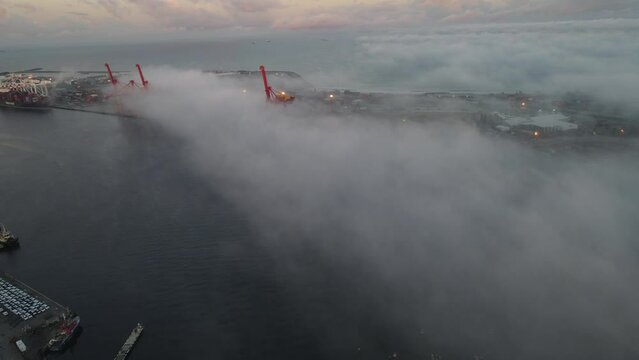 Fremantle port foggy dawn from drone