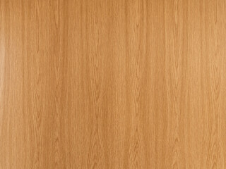 Wood veneer on a door. Full frame texture with wood grain. Natural material background in an...