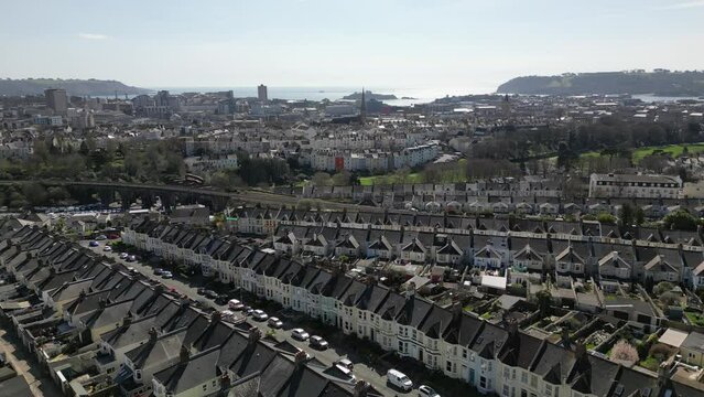 Aerial video of the city buildings on a sunny day, Plymouth, UK