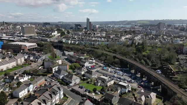 Aerial video of the city buildings on a sunny day, Plymouth, UK