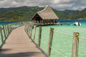 French Polynesia, Taha'a. Resort pier, dock and boat.