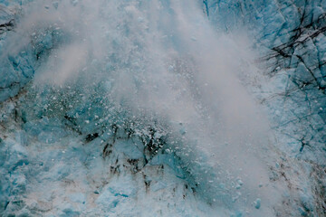 Chunks of ice drop from Margerie Glacier.