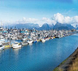 Fototapeta na wymiar Alaska, Homer. Landscape view of the marina with a mountain background.