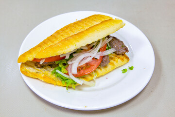 Turkish karisik atom Ayvalik tost ( kasarli bazlama tost) . Sucuklu, Kasarli, kavurmali karisik tost. Flat baked bread toasted